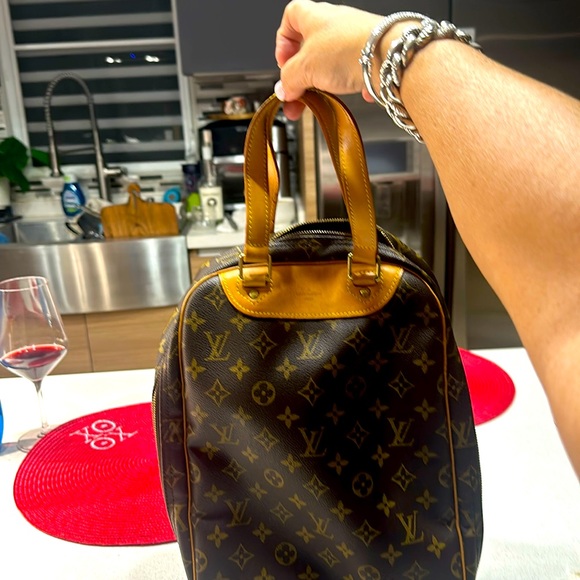 Louis Vuitton Handbags - Louis Vuitton Excursion Monogram Handbag